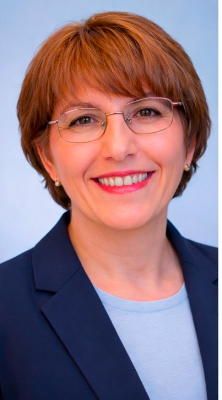 Professional headshot of Dr. Nour Masud